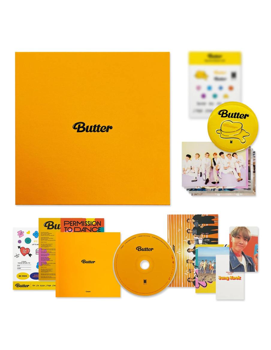 BTS - Single (BUTTER)  - BTS - Single [BUTTER]2 Versiones:  Cream (amarilla), Peaches (naranja)Este single de BTS contiene:- CD-